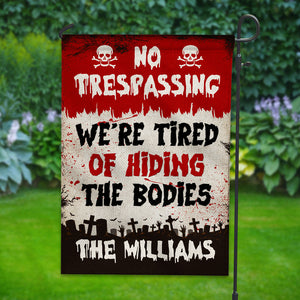 No Trespassing We're Tired Of Hiding The Bodies - Personalized Family Name Flag - Halloween Gift